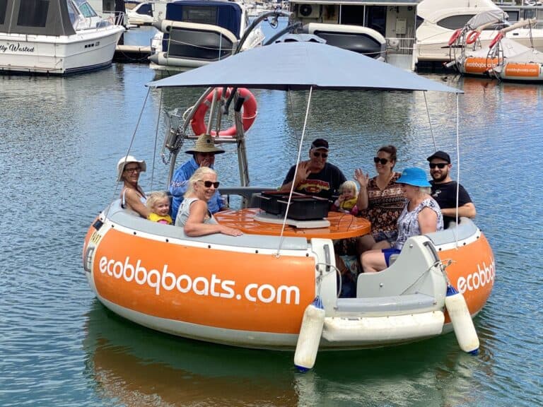 Group of friends enjoying an Eco BBQ Boat on the Mandurah canals