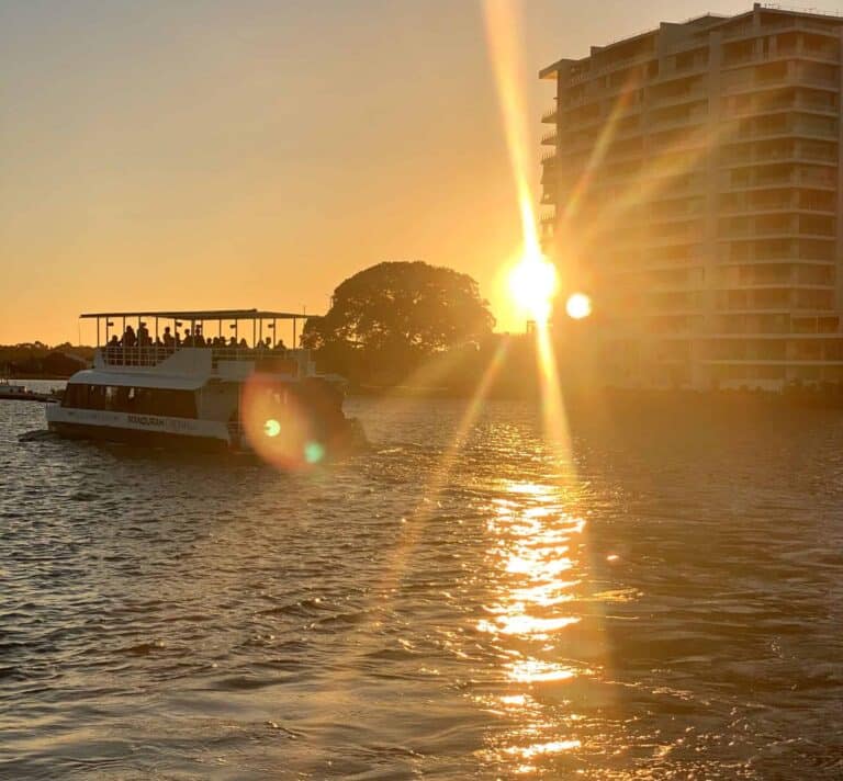 Sunset cruise on the water in Mandurah at golden hour