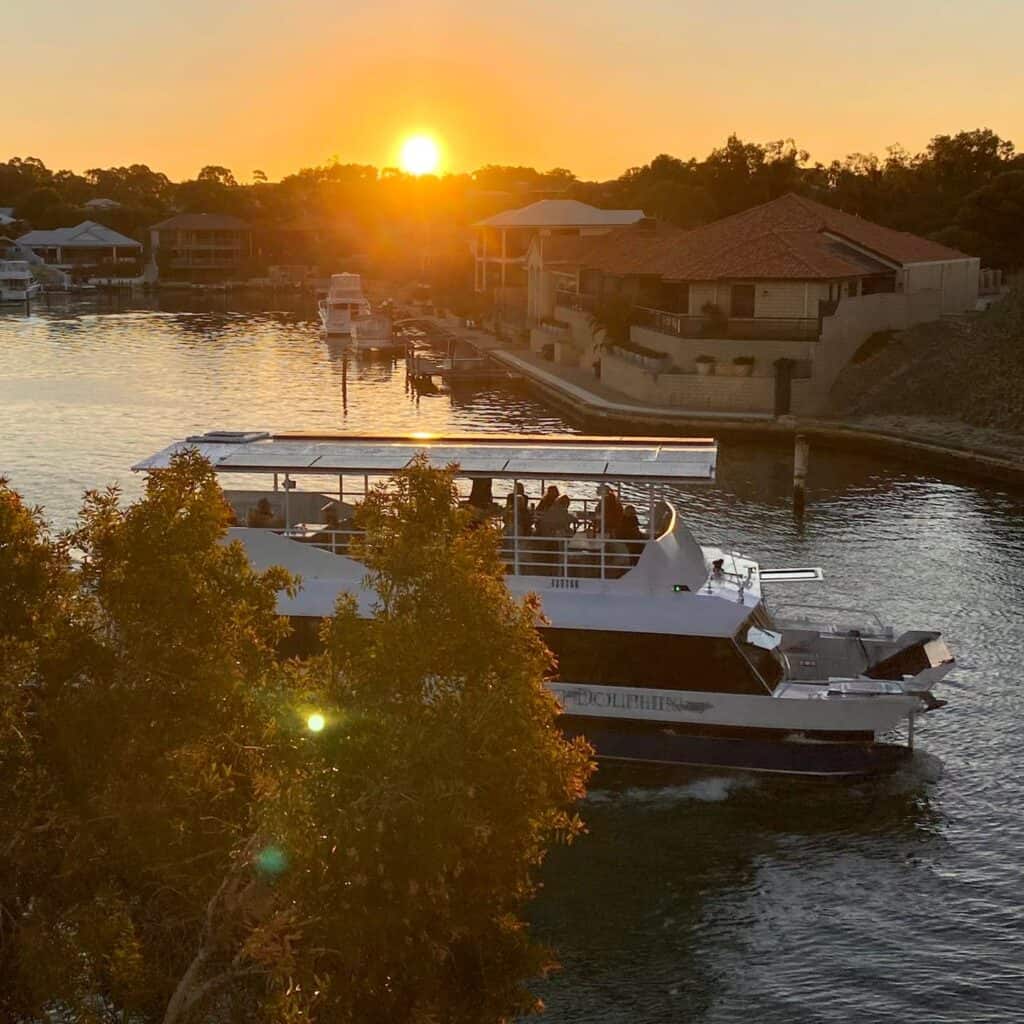 Mandurah Canals, Dancing Dolphin at Sunset
